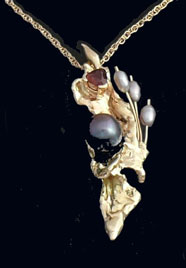 Studio Discovery Tour artist Walt Rush: Ravens Wing Gold Pendant