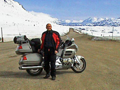 Don Kemp crossing White Pass into Canada on motorcycle