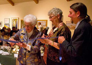 Elaine Jacob cut the red ribbon, launching the opening of the new elevator at Gualala Arts Center