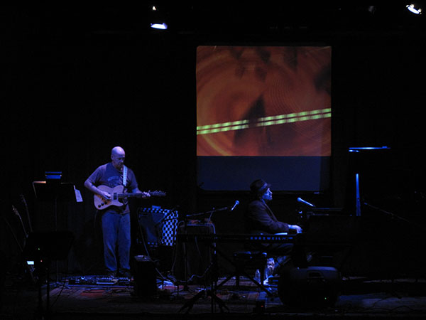 Bob Bralove & Henry Kaiser, video imagery by Hank Putek; photo by Robert Hantzsche
