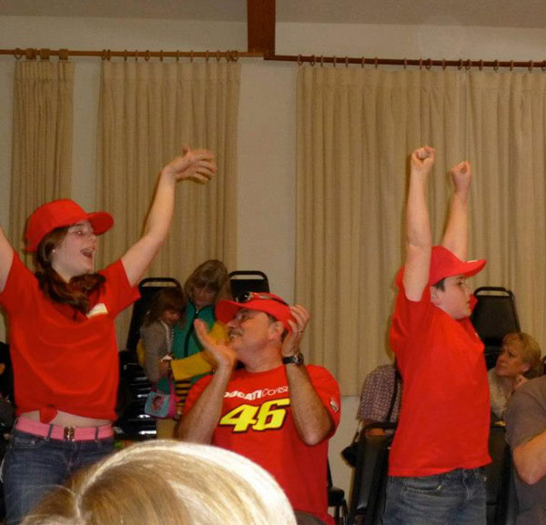 Team Claflin cheers it racers during the 9 to 13 Year class heats